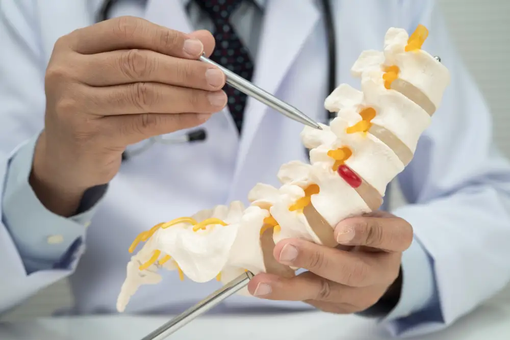 Orthopaedic surgeon explaining a spinal condition and discussing the diagnosis and treatment options.