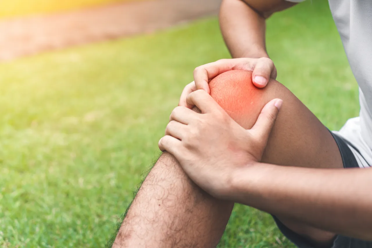 Man experiencing joint pain after an exercise injury